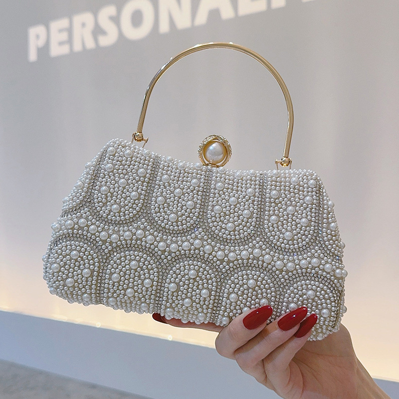 Vintage Fashion Events - Vintage clutch met parelkralen uit 2025,